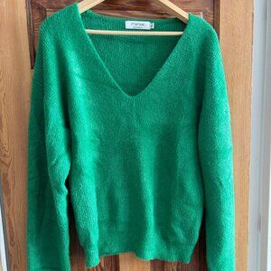 Green V-neck relaxed sweater